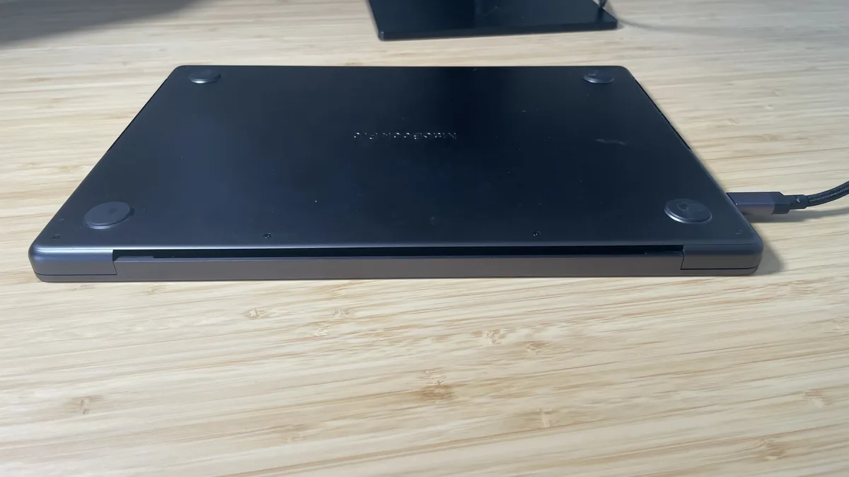 MacBook Pro M4 Pro air vent detail along the aluminum chassis